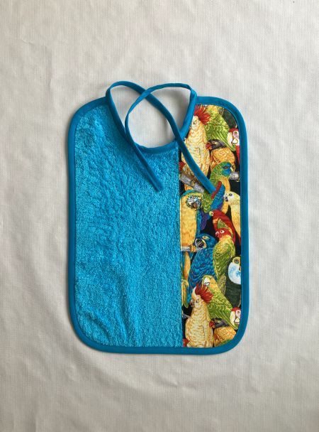 binde-laetzchen_mit_papageien_türkis