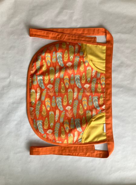 chlaemmerlisack_schuerze_orange_mit_federn